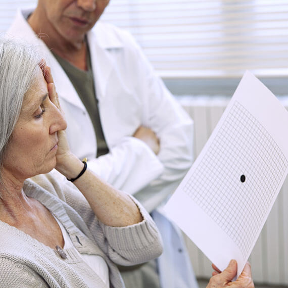 Woman Taking an Amsler Grid Test